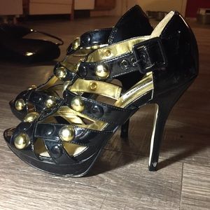 Women’s size 7 black straps/gold beading heels
